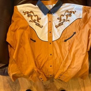 Women’s cowboy shirt with snaps, embroidery.  Great for Dress up, very nice.